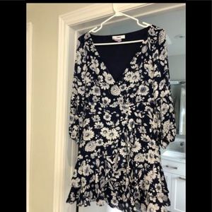 Likely blue and white floral dress
